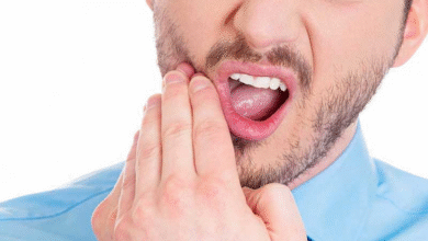 چرا دندان ترمیم شده هنگام گاز زدن درد میگیرد؟ علل، تشخیص و روشهای درمان